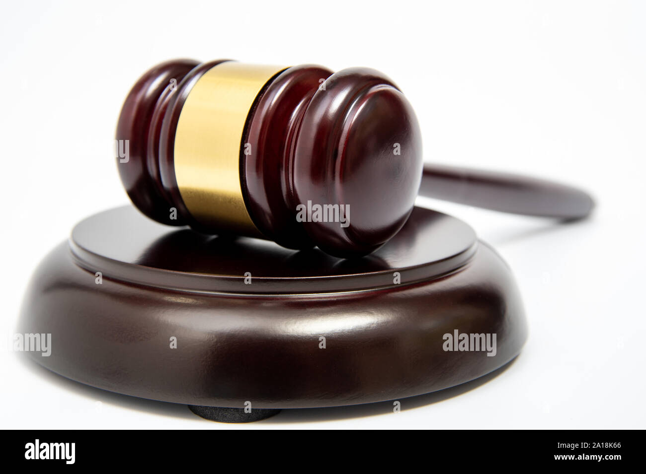 A wooden judge gavel isolated on white background. Stock Photo
