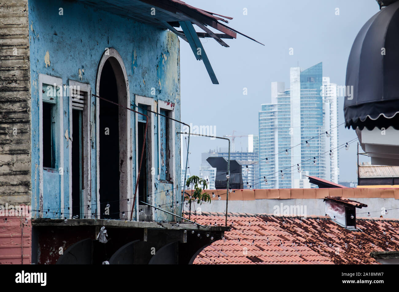 Panama City buildings is seen through the old balconies of Casco Antiguo Stock Photo