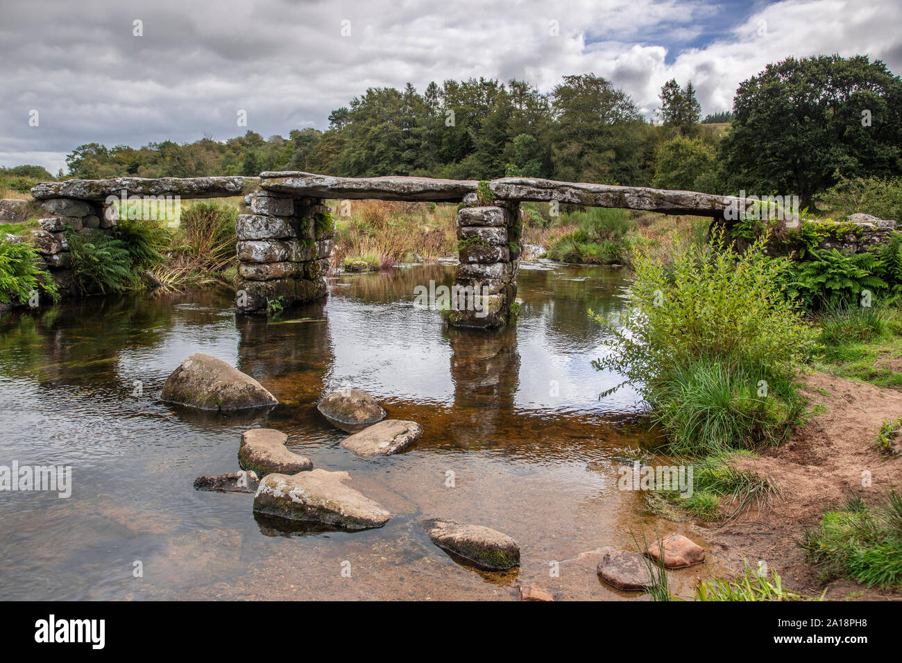 Ancient Clapper Bridge at Postbridge, Dartmoor, Devon, England Stock Photo