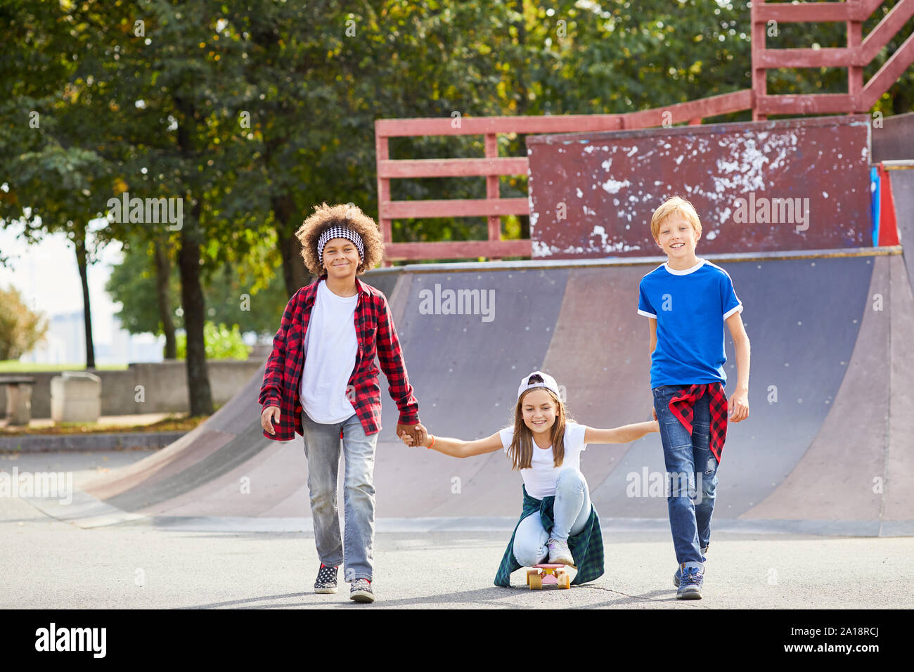 Two boys holding hands hi-res stock photography and images - Alamy