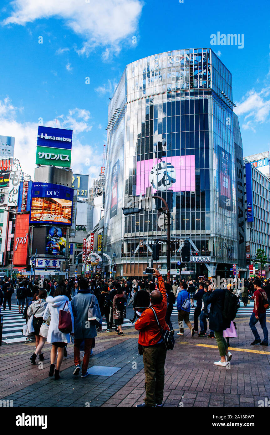 DEC 5, 2019 Tokyo, Japan - Shibuya junction busy pedestrians crosswalk with many asian tourist and Japanese people, famous shopping district in Tokyo Stock Photo