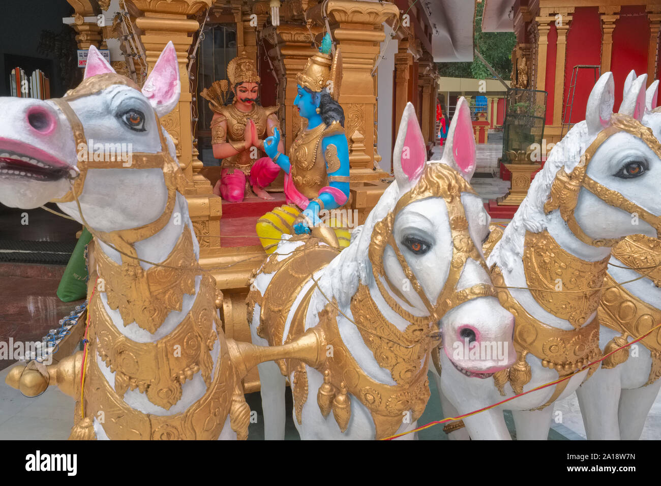 A display depicting a scene from the Bhagavad Gita, Krishna instructing warrior Arjuna; Kudroli Gorkarnatheswara Temple, Mangalore, Karnataka, India Stock Photo