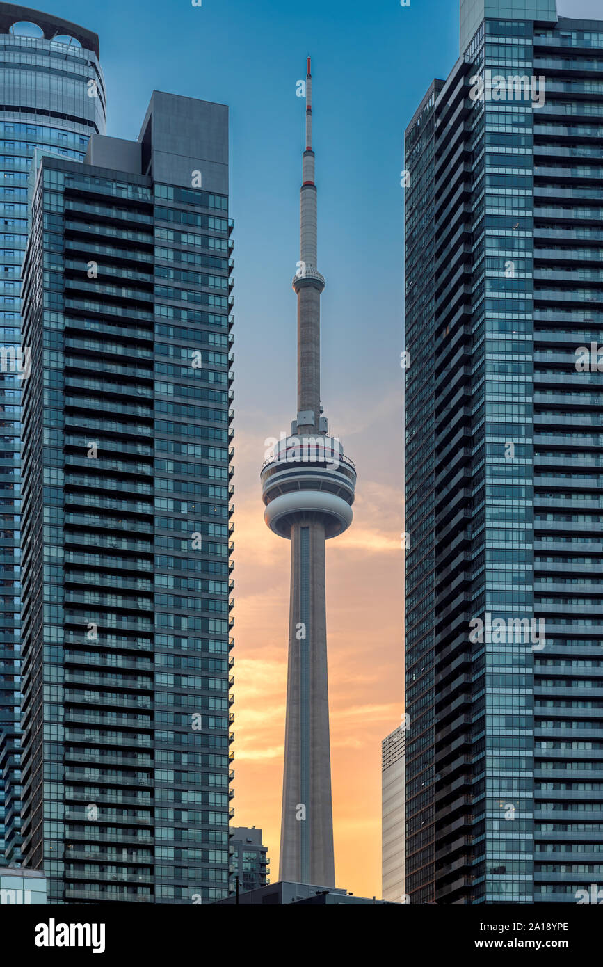 CN Tower at sunset in Toronto downtown, Canada Stock Photo
