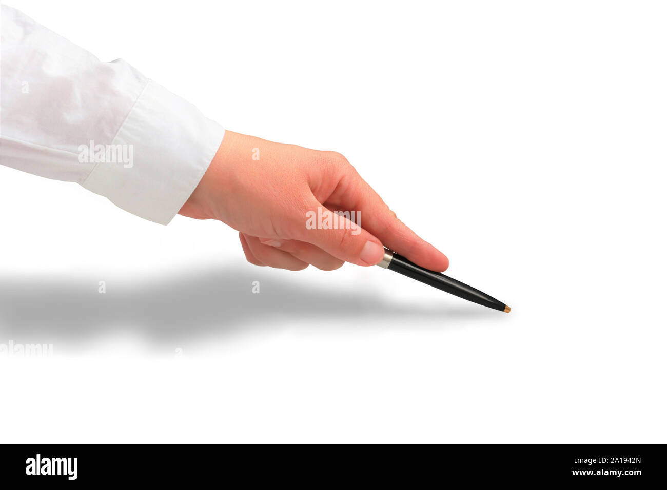 Woman's hand in white shirt sleeve pointing at something with a luxury pen. body part close up with a shadow isolated on white background Stock Photo