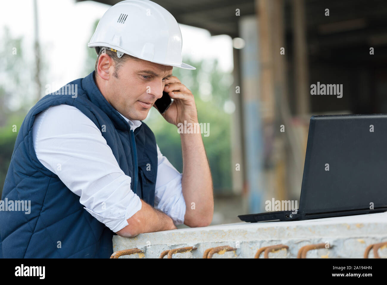 architect supervising a construction outdoords Stock Photo