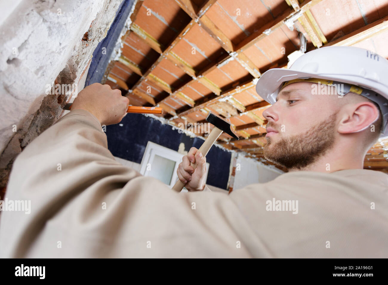 bricklayer tools men working construction Stock Photo - Alamy