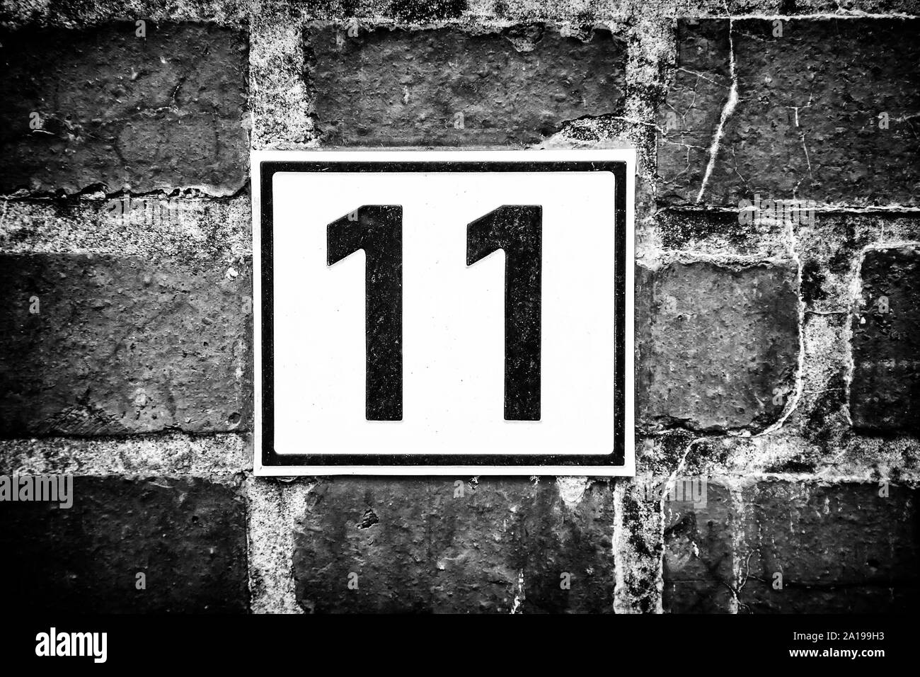 House number 11 sign Black and White Stock Photos & Images - Alamy