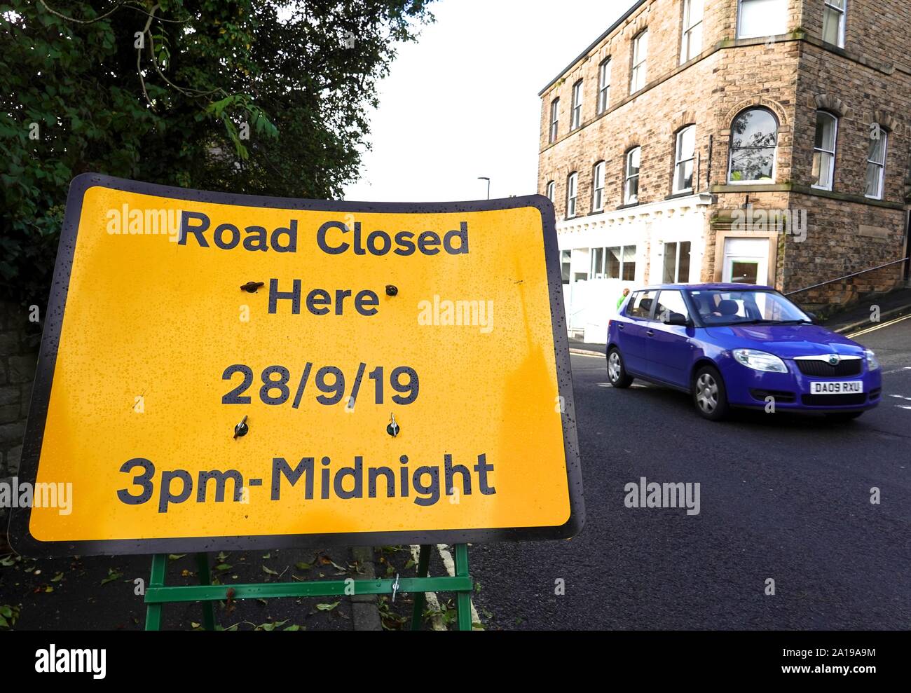 Road closure notice on Market Street, New Mills, Derbyshire due to the