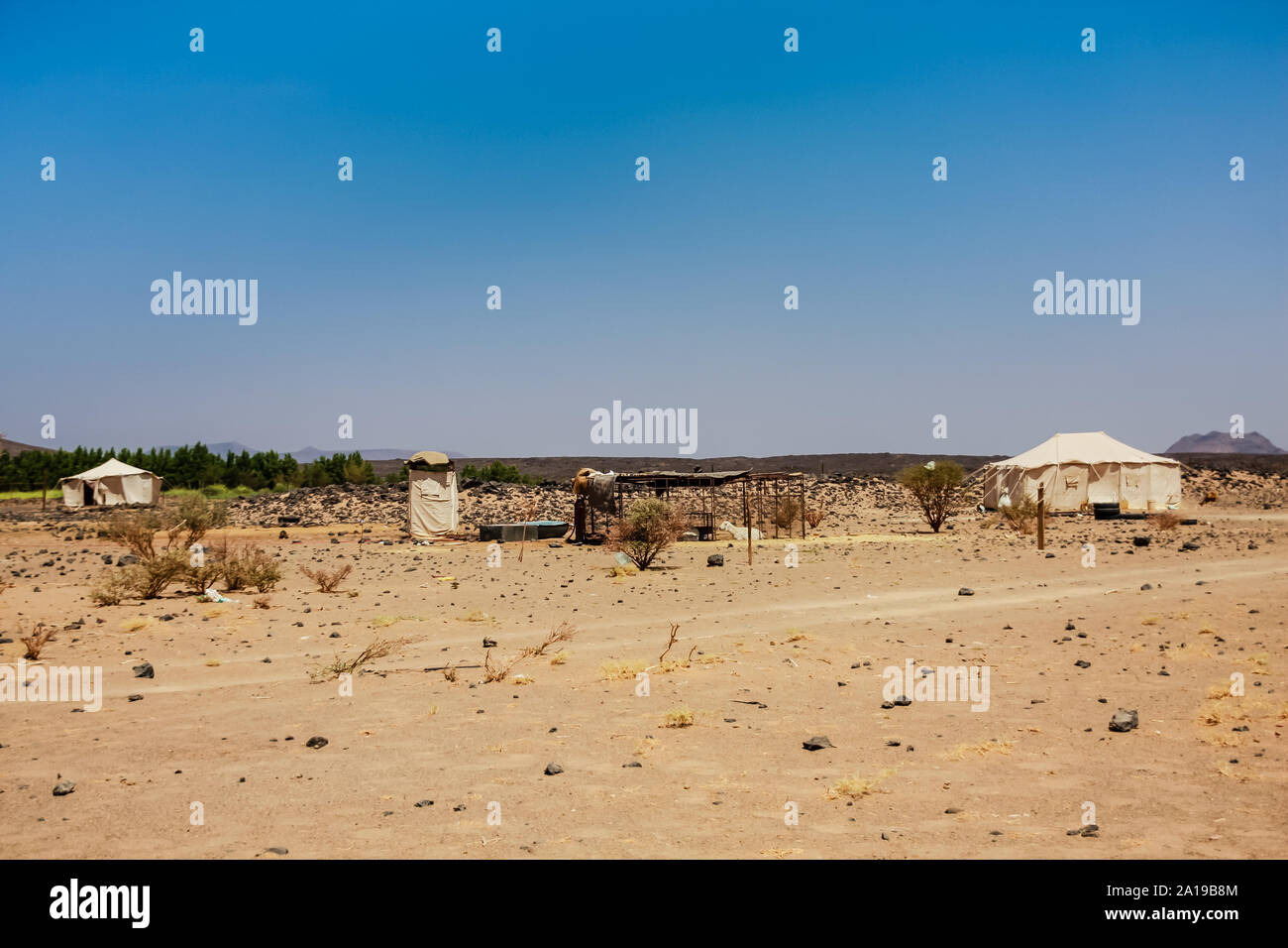 A Bedouin camp in Harrat Kishb near Umm Aldoom, Saudi Arabia Stock Photo