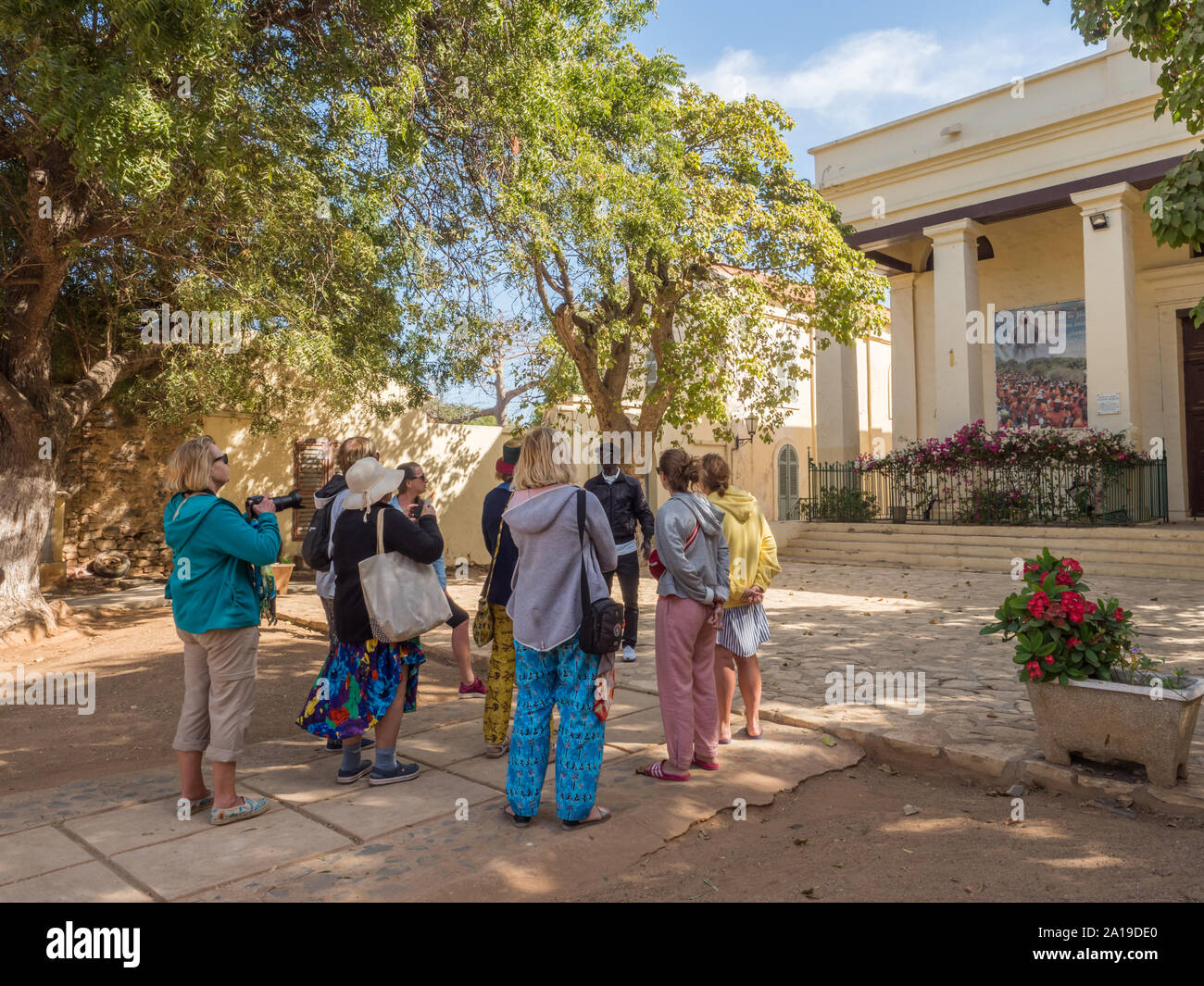 Goree, Senegal- February 2, 2019: Tourists before catholic church  on the Goree island. Gorée. Dakar, Senegal. Africa. Stock Photo