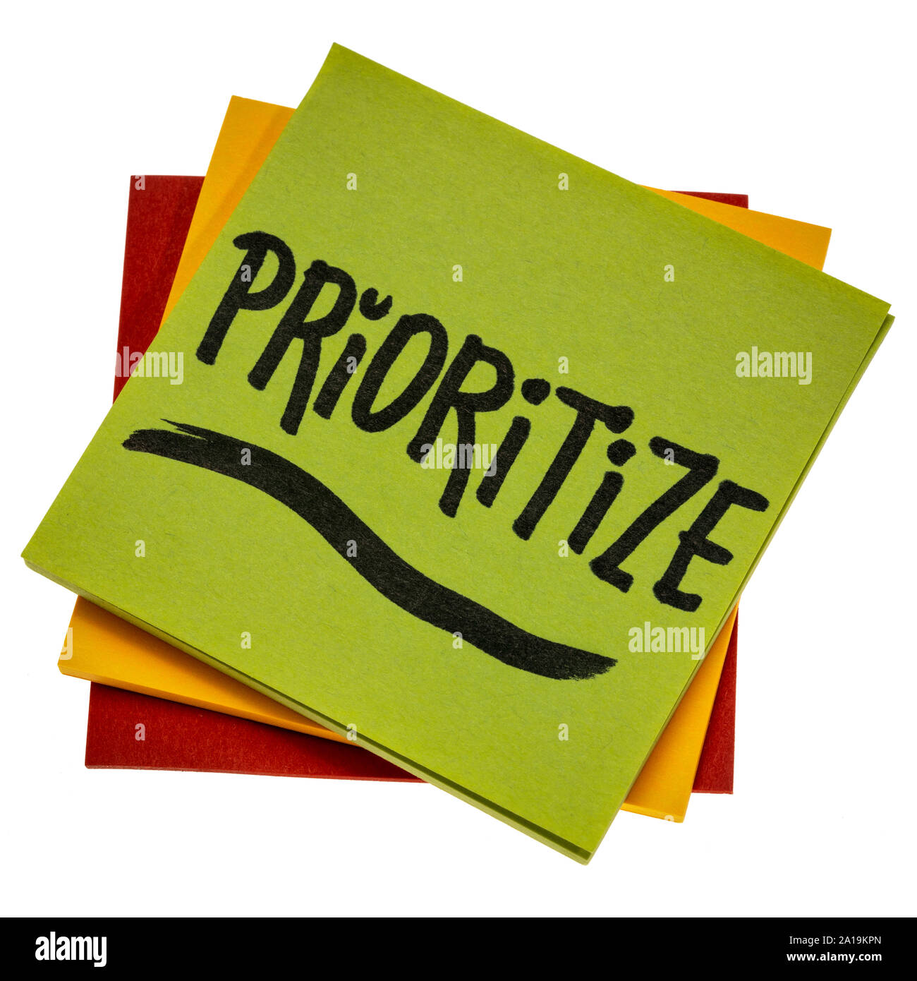 prioritize advice or reminder - handwriting on an isolated sticky note, personal life or business productivity and efficiency concept Stock Photo