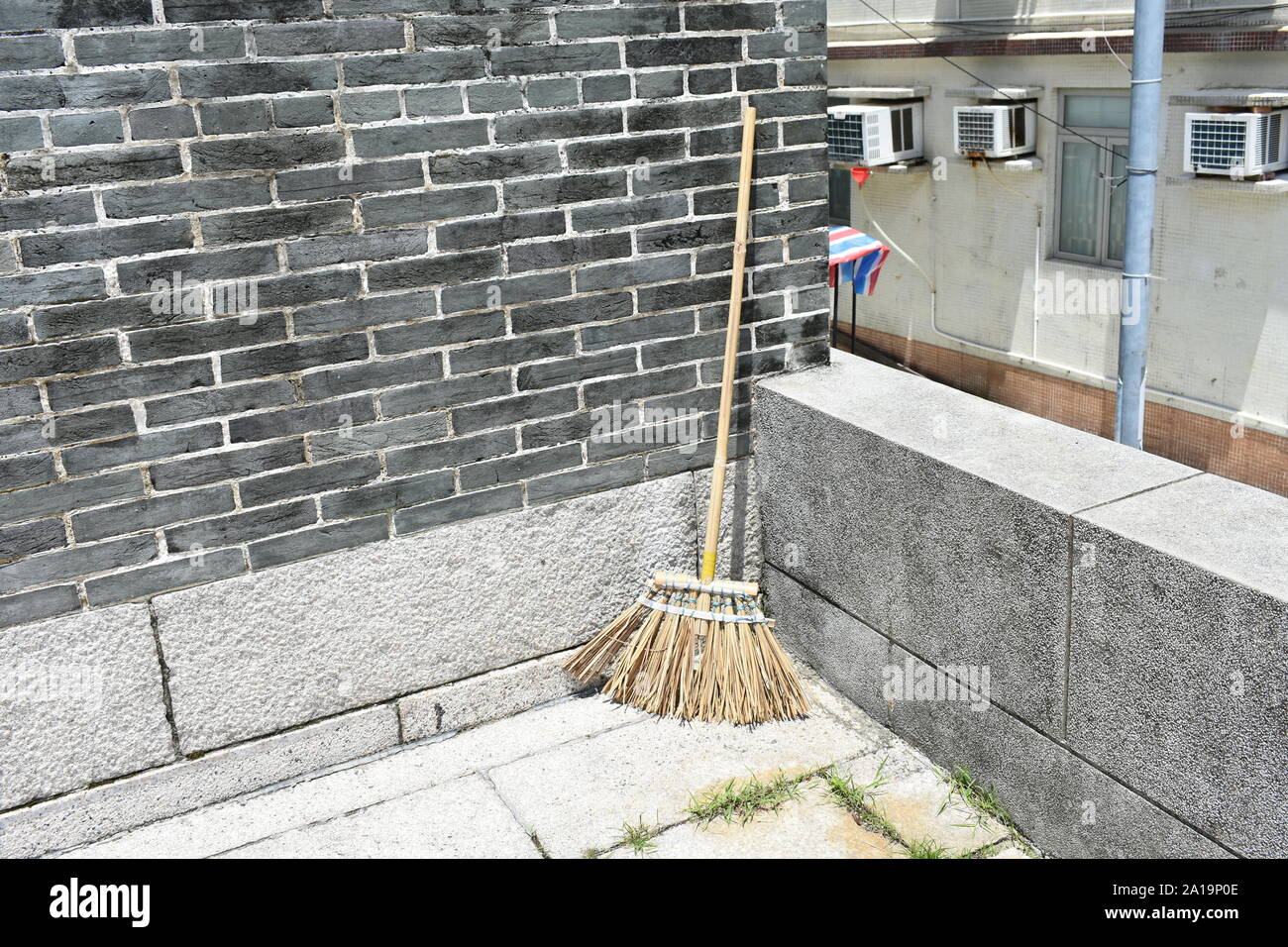 straw broom in asian village Stock Photo