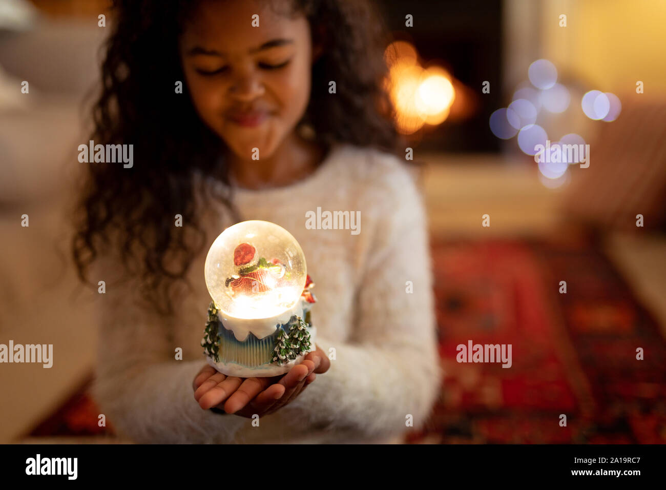 Girl at home at Christmas time Stock Photo