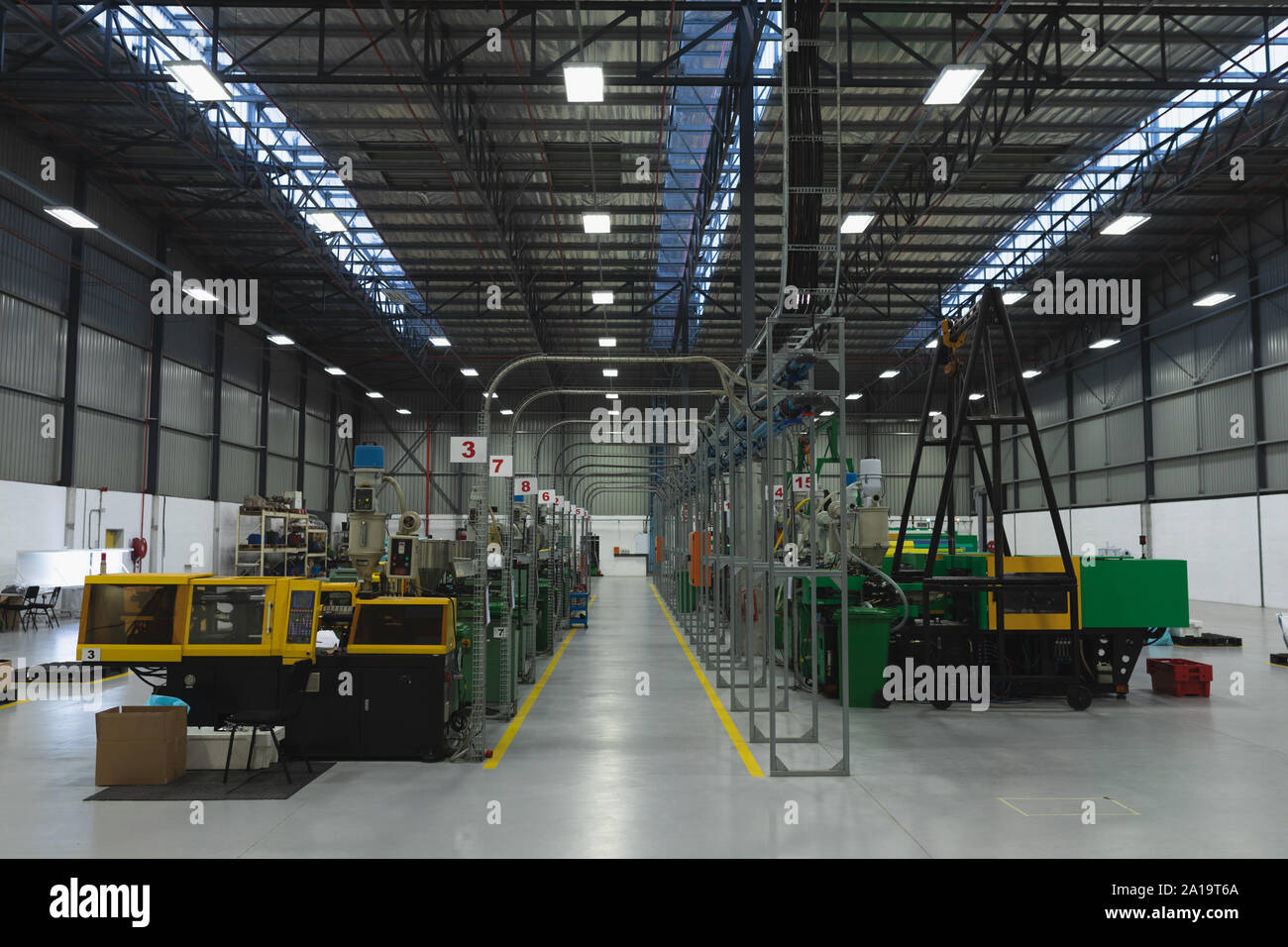 Machinery in a factory warehouse building Stock Photo