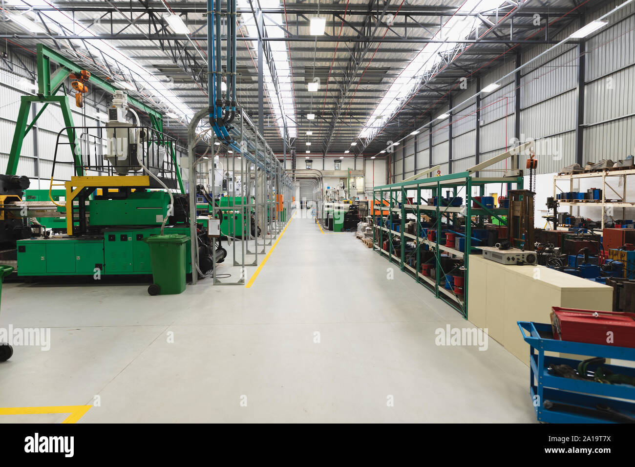 Machinery in a factory warehouse building Stock Photo