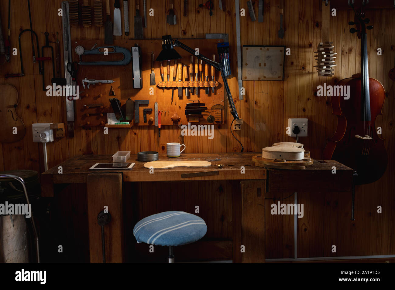 Violin being made in a workshop Stock Photo