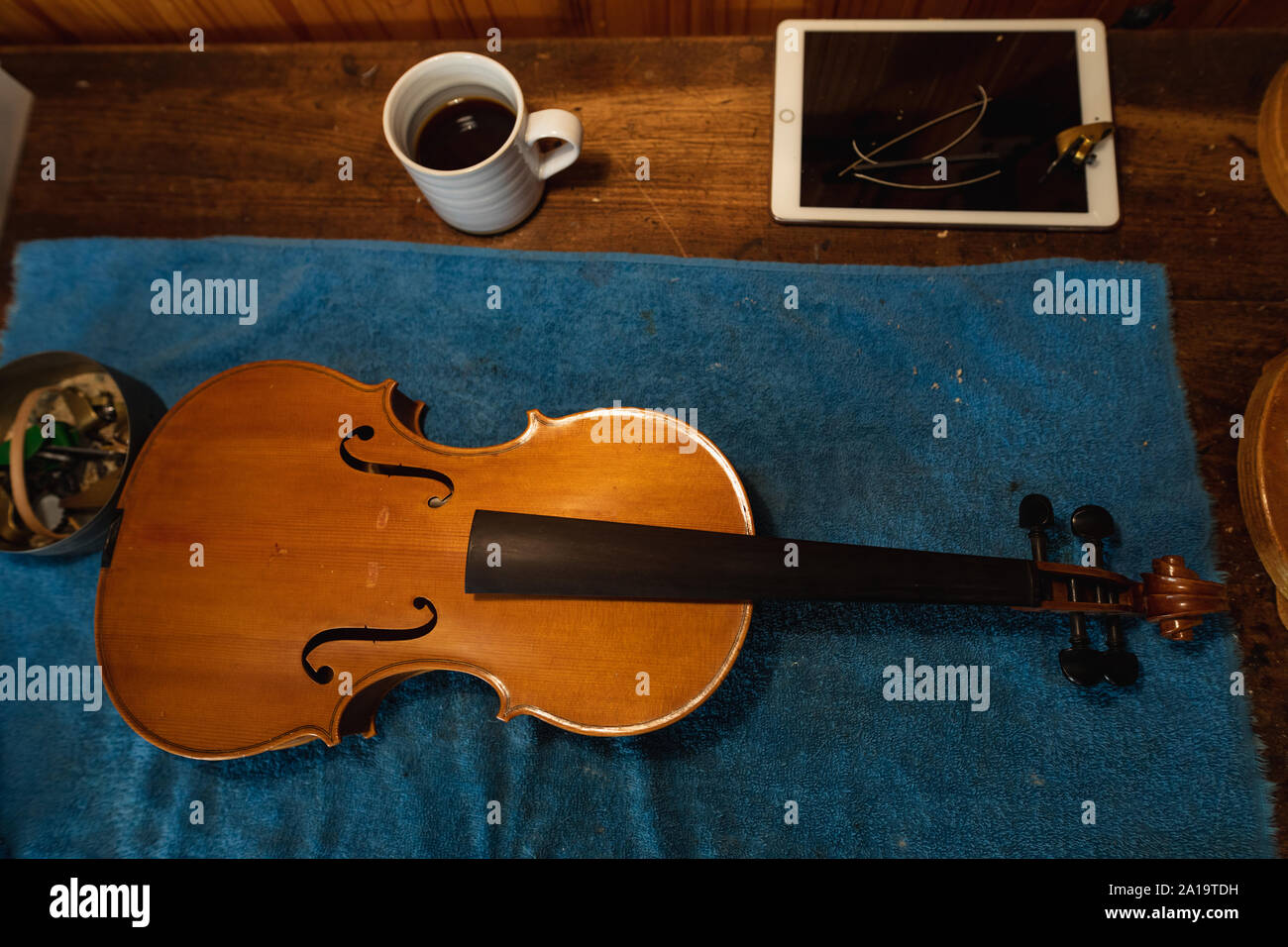 Violin being made in a workshop Stock Photo