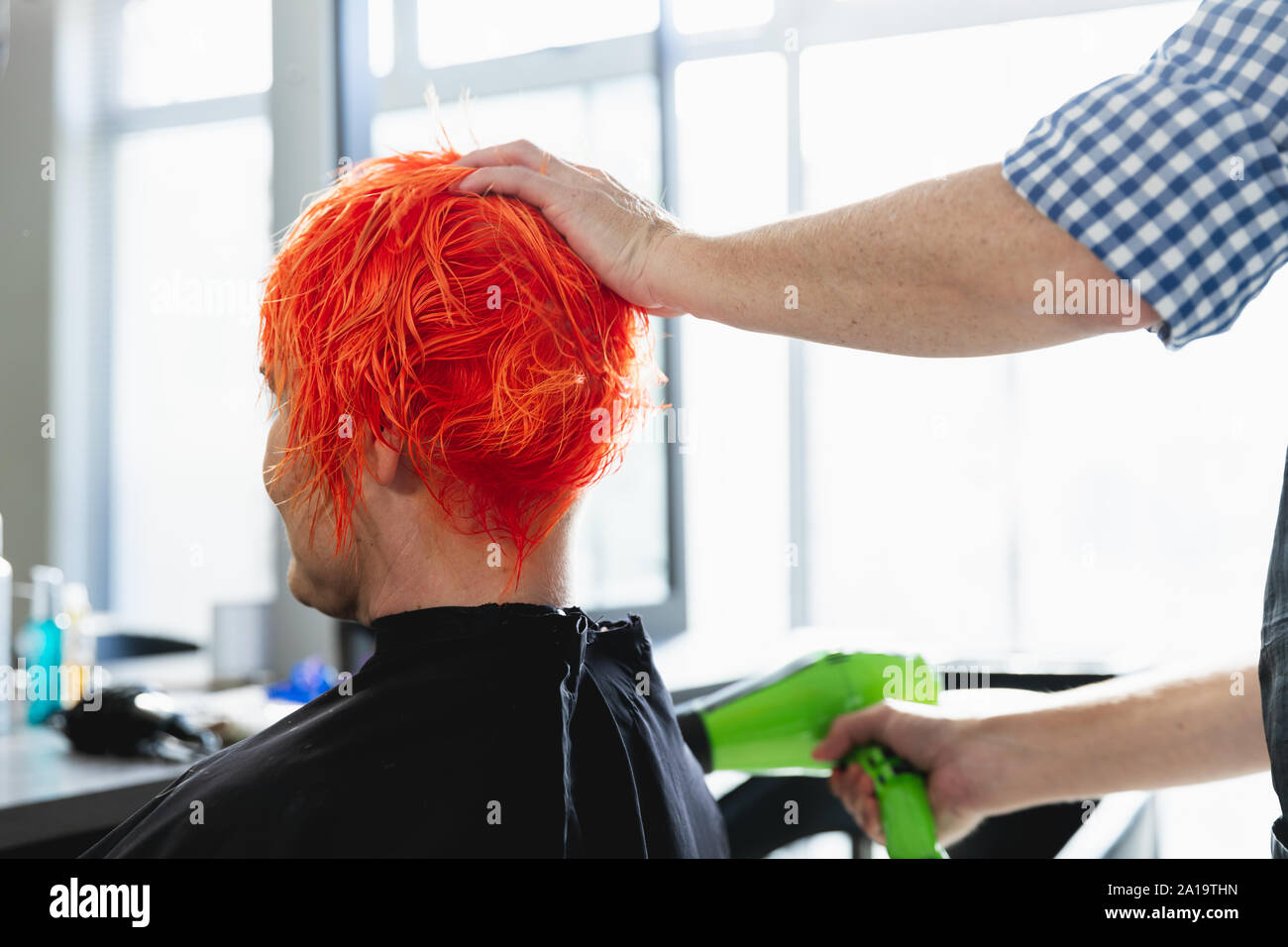 Hair stylist dry in salon hi-res stock photography and images - Alamy