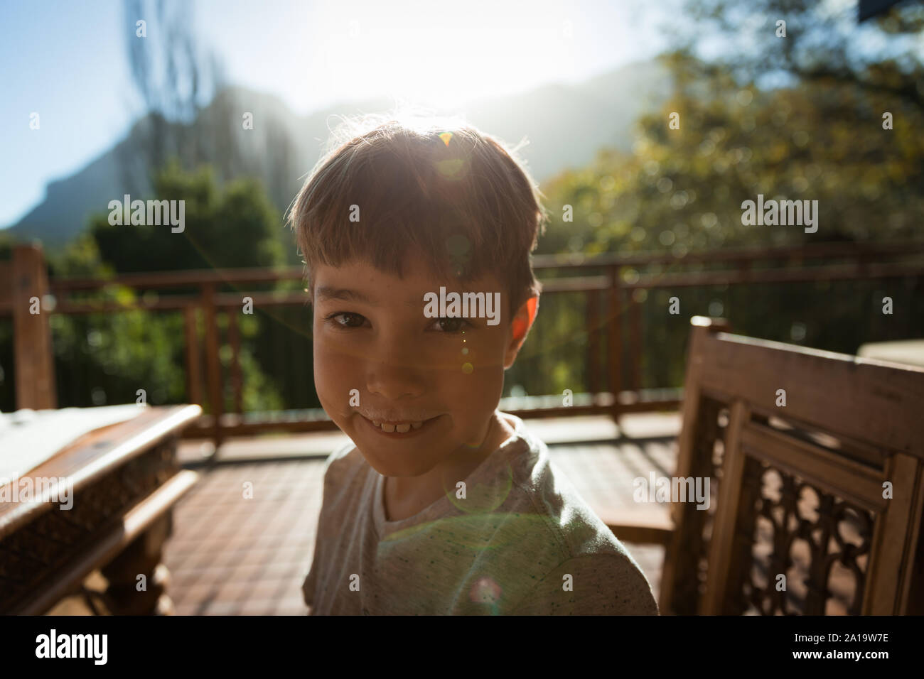 Happy child boy sitting table hi-res stock photography and images - Alamy