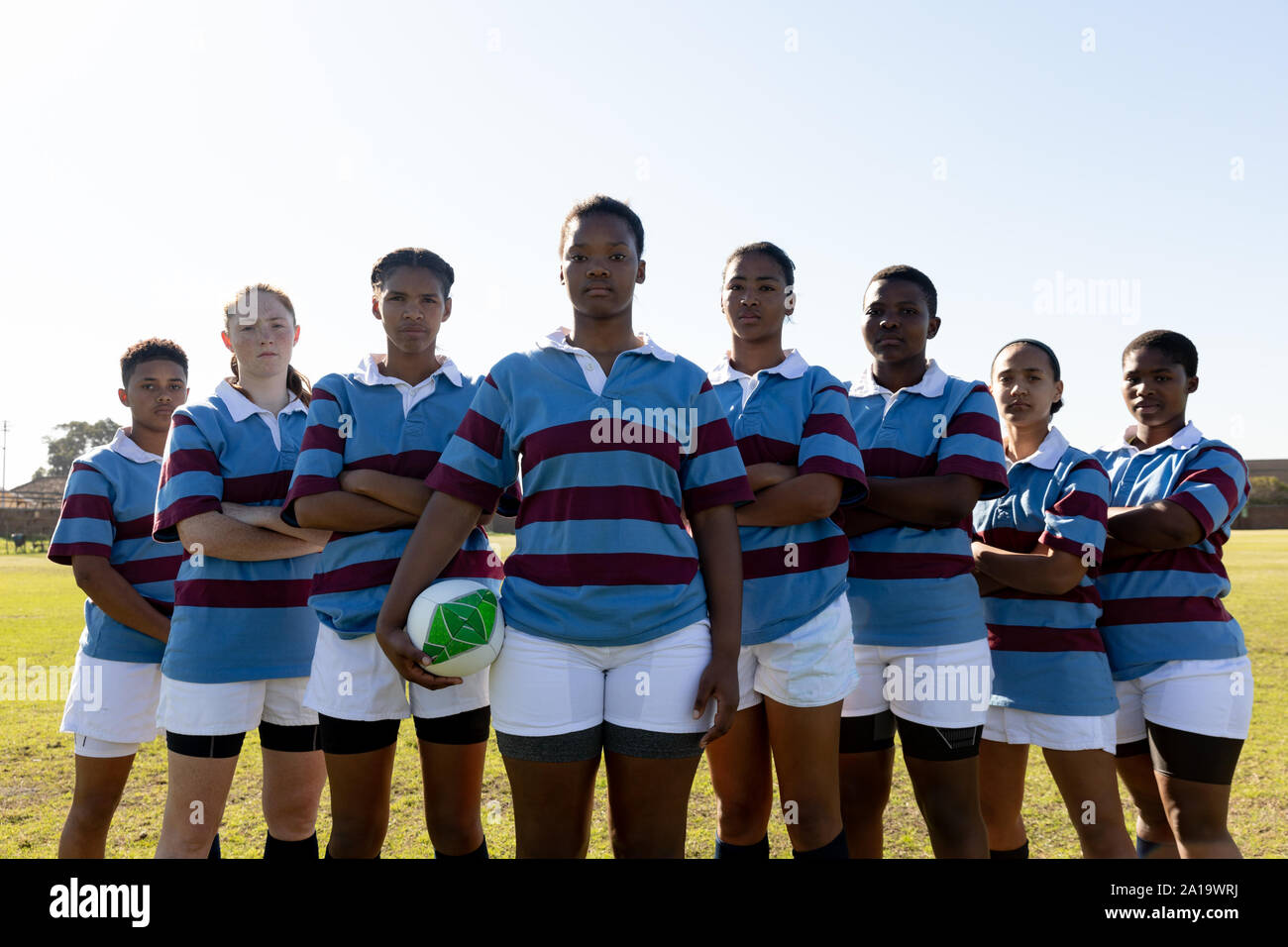 Portrait of young adult female rugby team Stock Photo