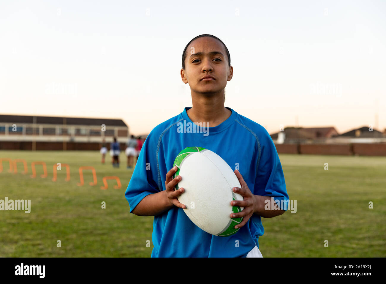Portrait of young adult female rugby player on a rugby pitch Stock ...
