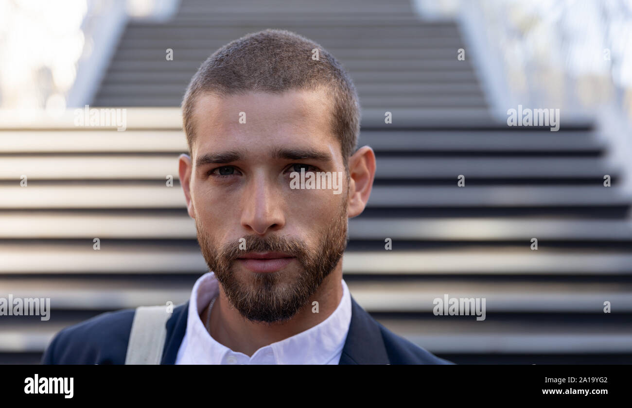 Portrait of young professional man on the go Stock Photo