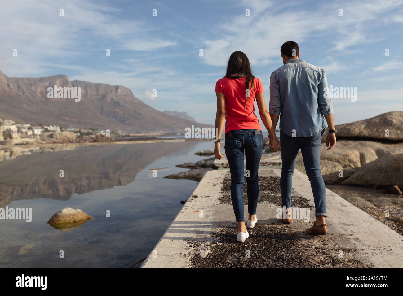 Couple holding hands out hi-res stock photography and images - Alamy