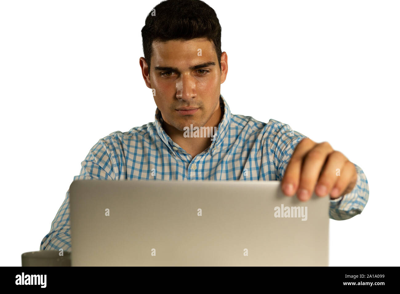 Young businessman using a laptop Stock Photo