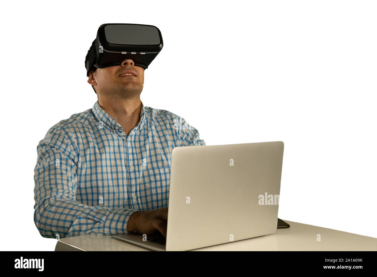 Young businessman using a VR headset Stock Photo