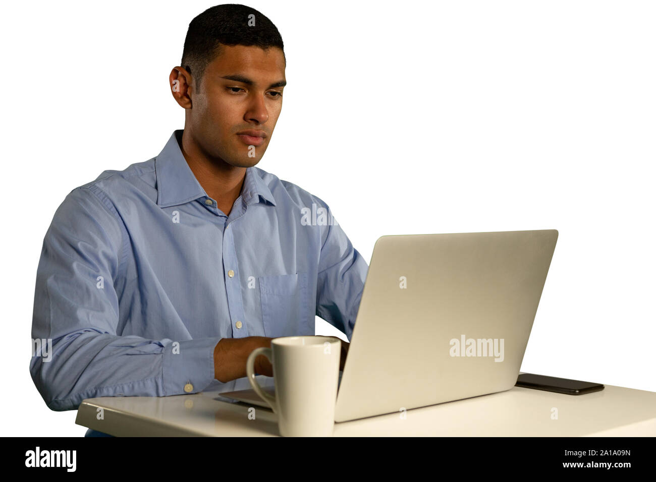 Young businessman using a laptop Stock Photo