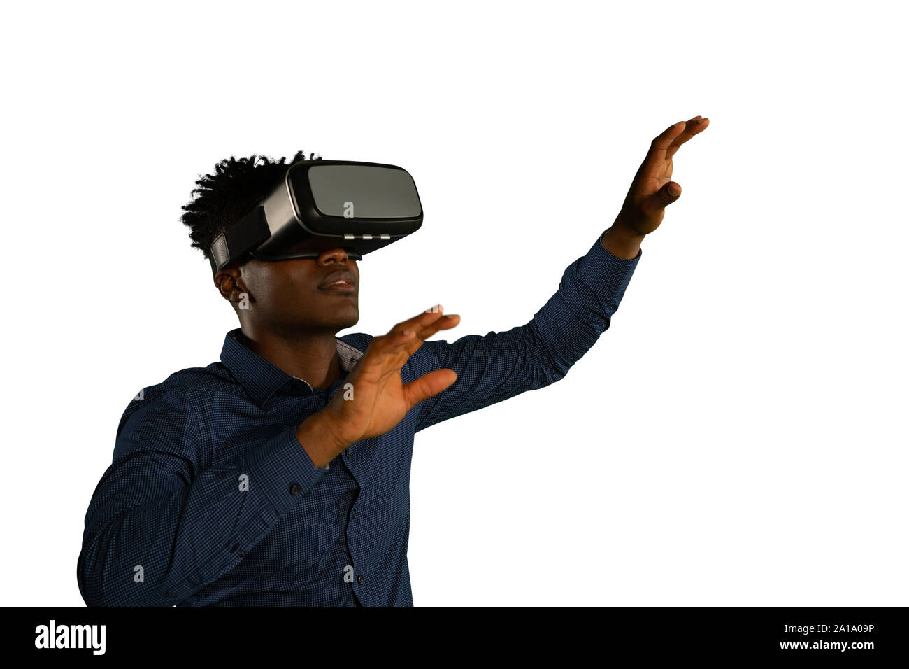Young businessman using a VR headset Stock Photo