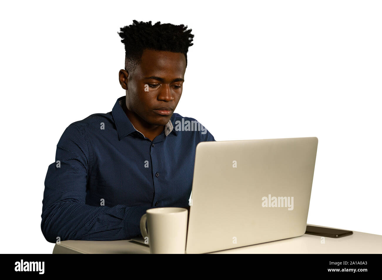 Young businessman using a laptop Stock Photo