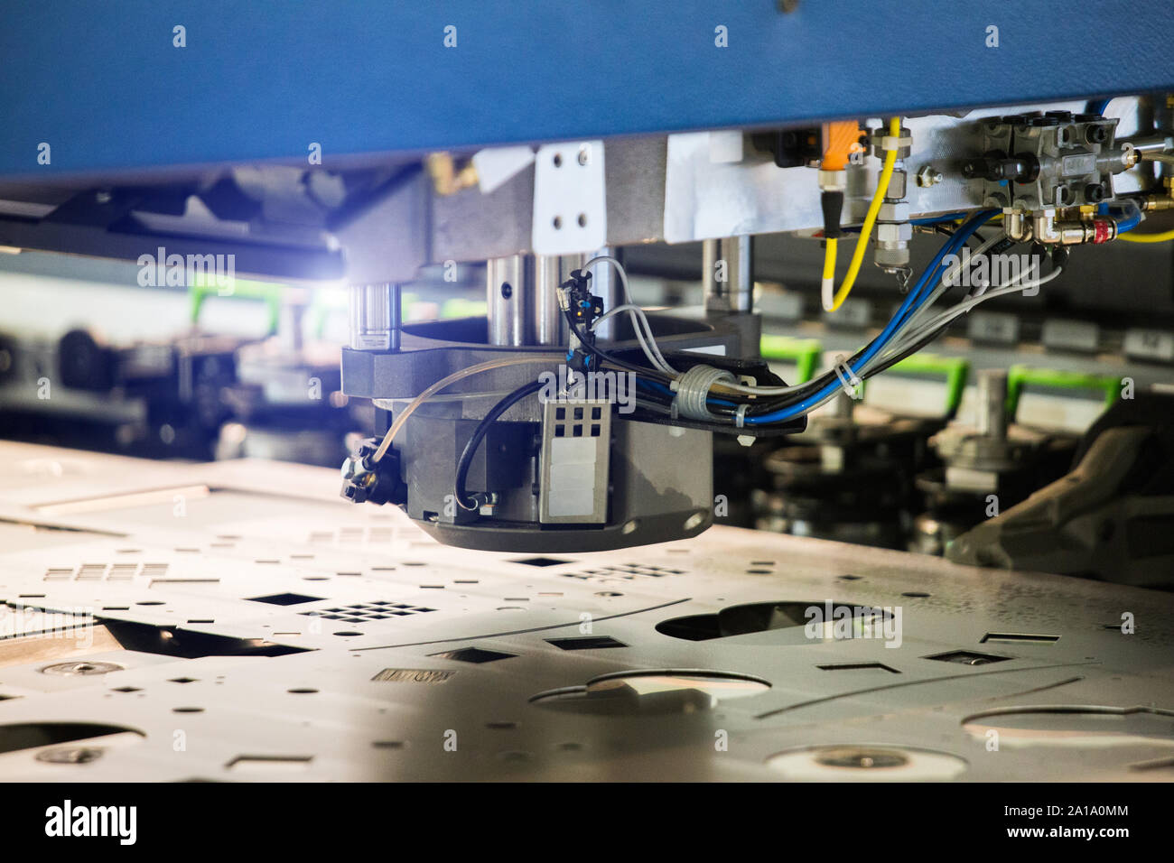 Robot for stamping metal products during work. Modern automated factory Stock Photo
