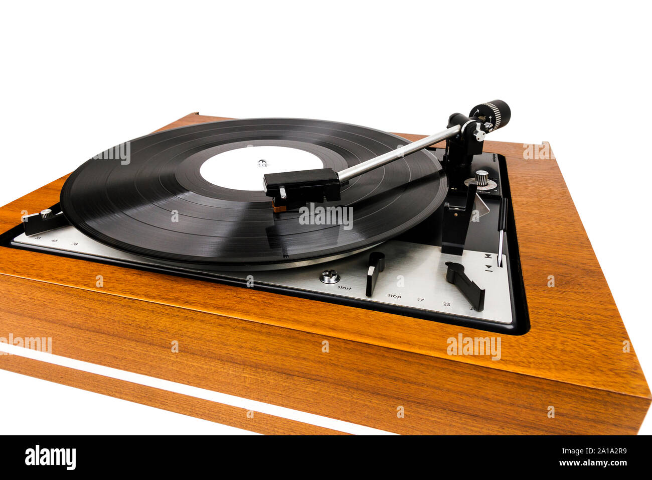 Vintage turntable vinyl record player isolated on white. Wooden plinth ...