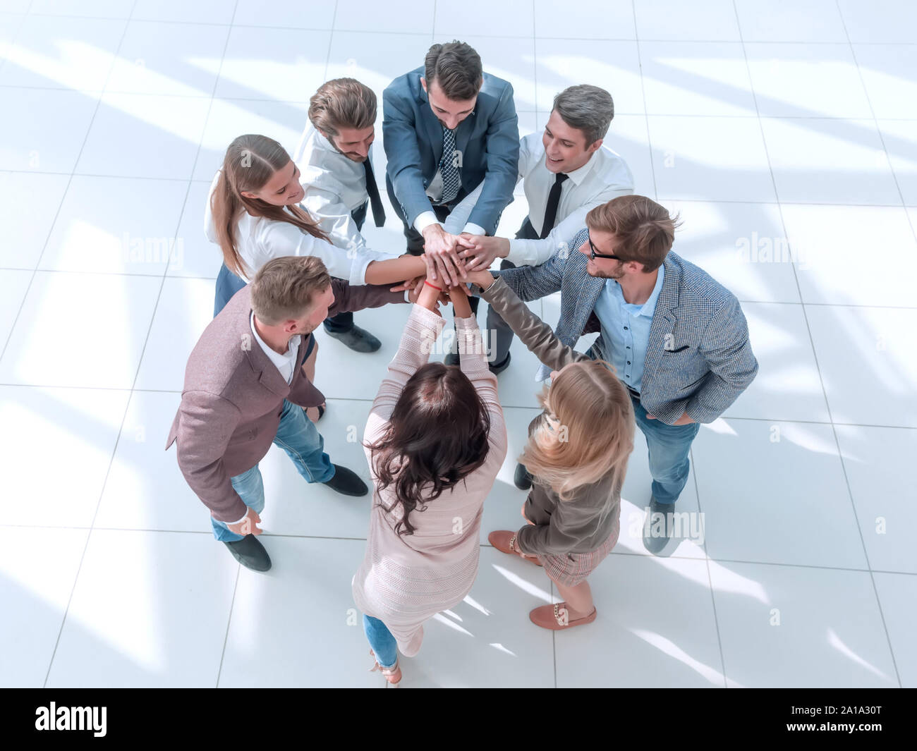 top view. corporate business team showing their unity Stock Photo - Alamy