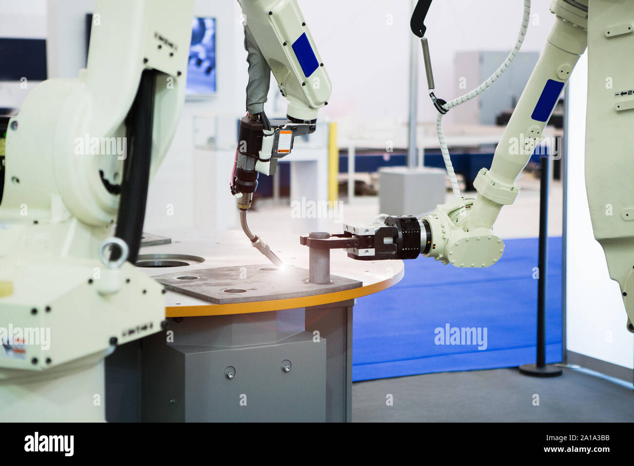 Automatic welding robot in a modern factory in operation Stock Photo ...