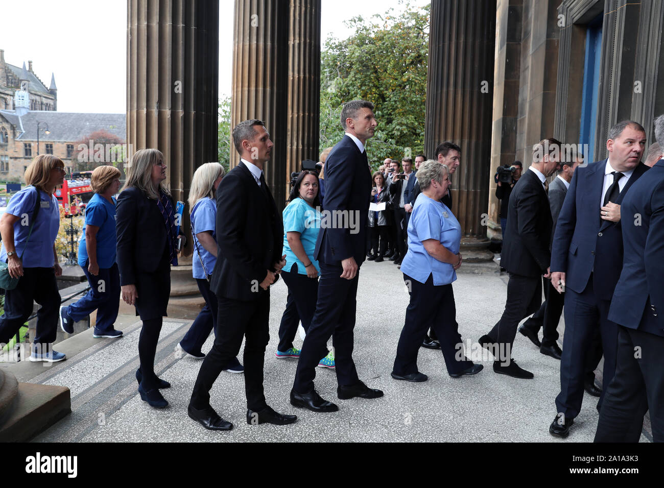 Peter Lovenkrands and Tore Andre Flo attend the funeral of former Rangers footballer Fernando Ricksen at Wellington Church, Glasgow. Stock Photo