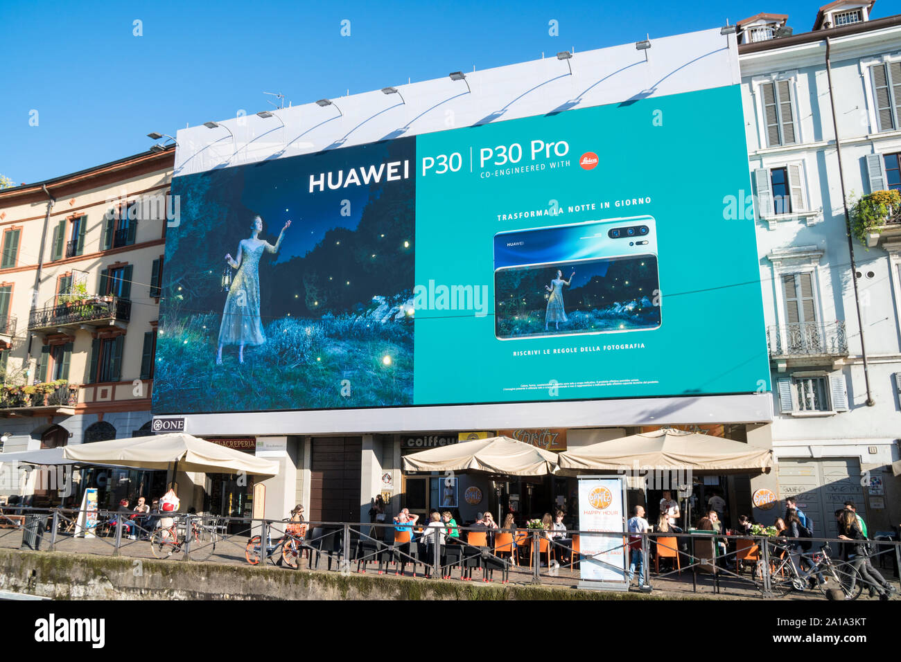 Milan, Italy: Giant advertising billboard for the promotion of the P30 and P30 Plus, the new smartphones from Huawei, in the Navigli district Stock Photo