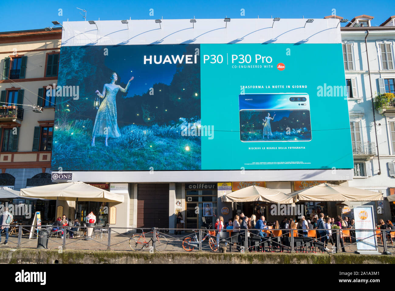 Milan, Italy: Giant advertising billboard for the promotion of the P30 and P30 Plus, the new smartphones from Huawei, in the Navigli district Stock Photo