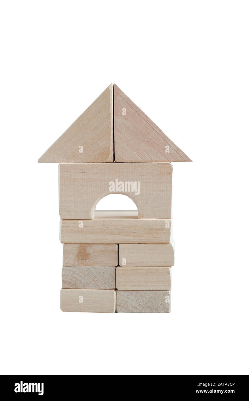 Wooden block house on white background. wooden building blocks