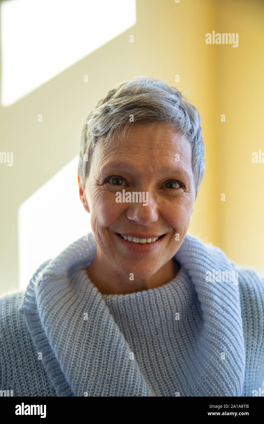 Smiling mature woman home hi-res stock photography and images - Alamy