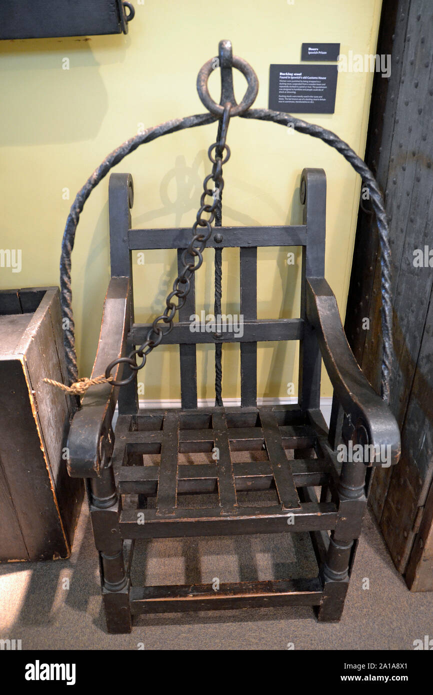 A Ducking Stool, used as an instrument of torture and punishment in Victorian England. On display in Ipswich Museum, Ipswich, Suffolk, UK. Stock Photo