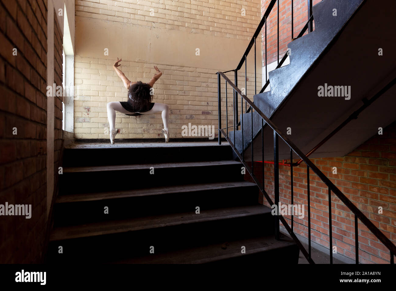 Female dancer in an empty warehouse Stock Photo Alamy