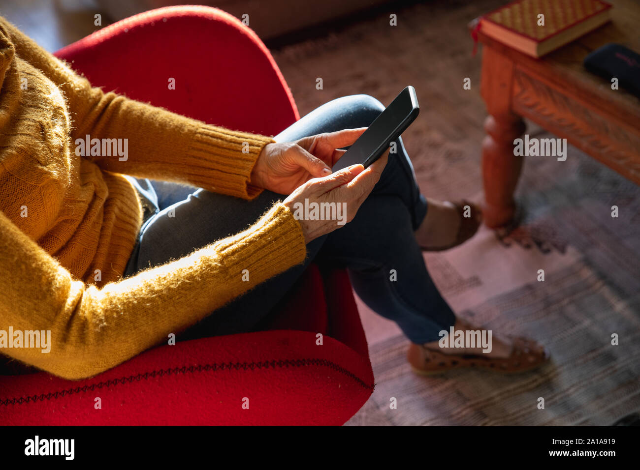 Mature woman smartphone typing hi-res stock photography and images - Alamy