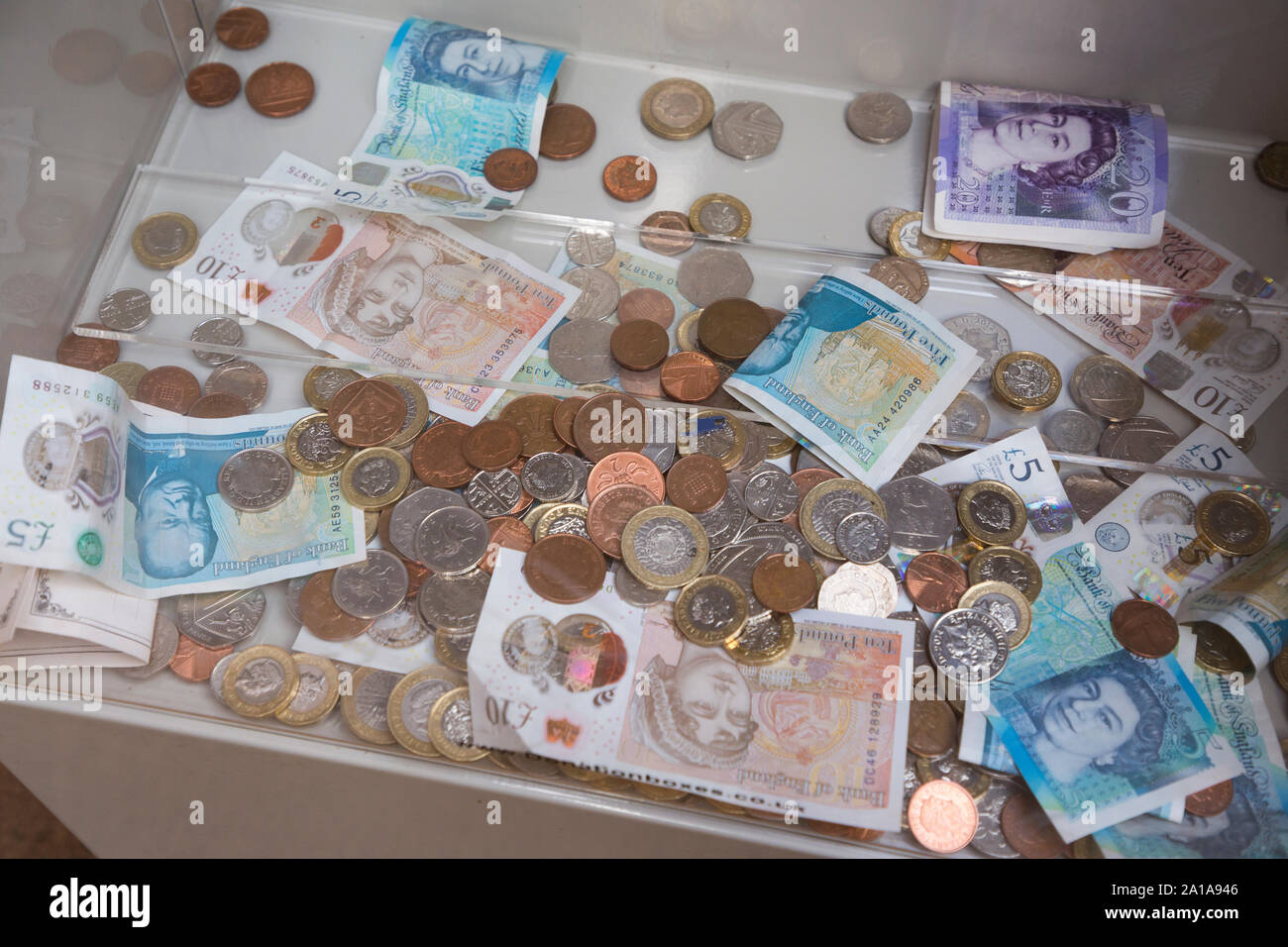 Money box collection for currency / small change / notes / cash / coins donation / donations for support of SS Great Britain, Brunel's steam powered ship, now a museum attraction in Bristol. UK (109) Stock Photo