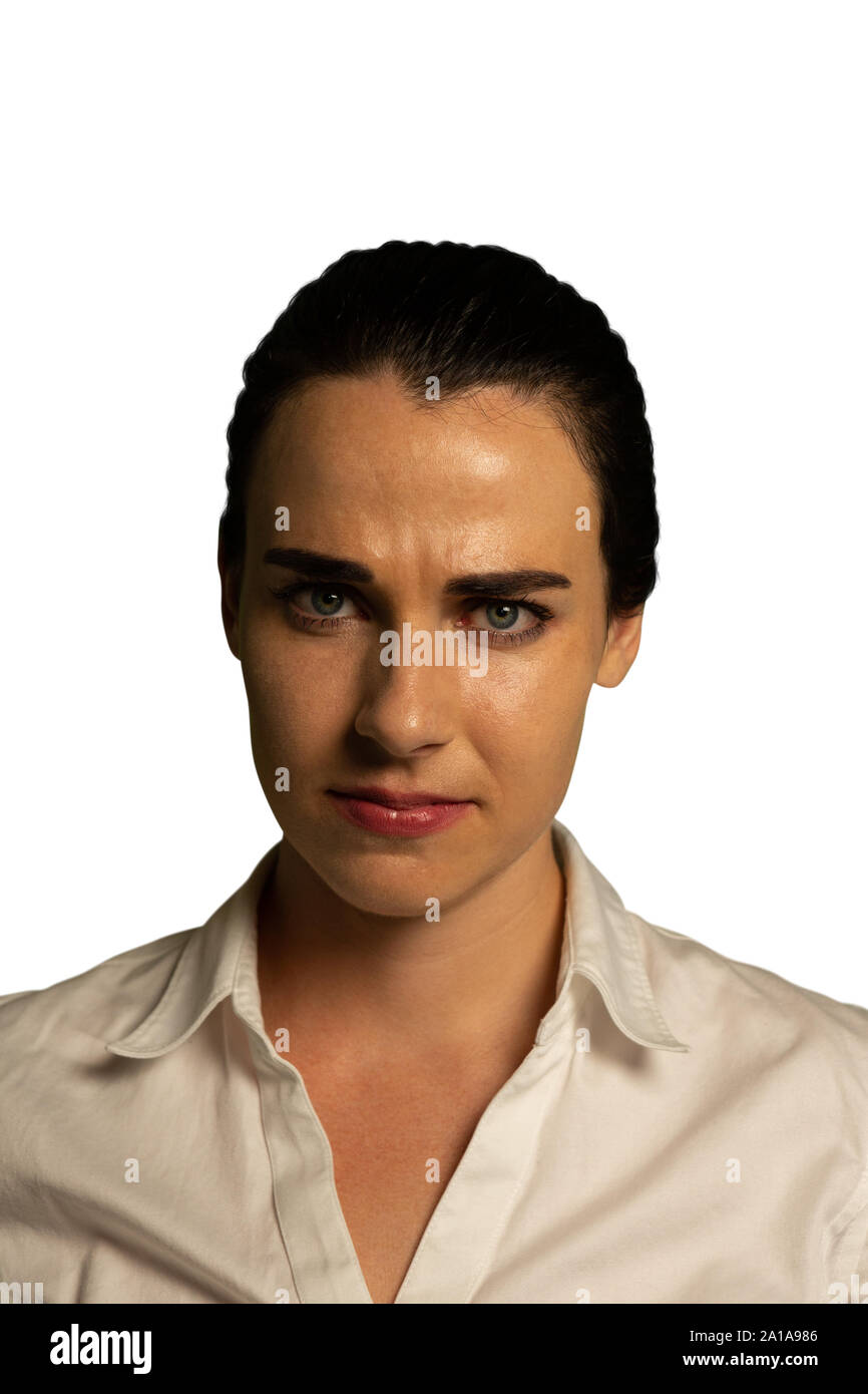 Puzzled businesswoman looking at camera Stock Photo
