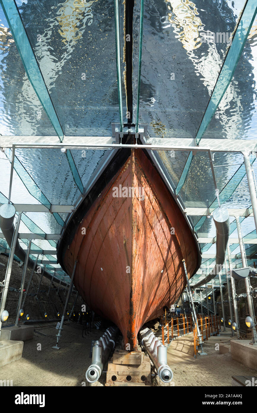 Hull / bow / bows of the SS Great Britain, Isambard Kingdom Brunel 's iron ship looking up from under / through the glass sea at dry dock, Dockyard museum in Bristol. UK (109) Stock Photo