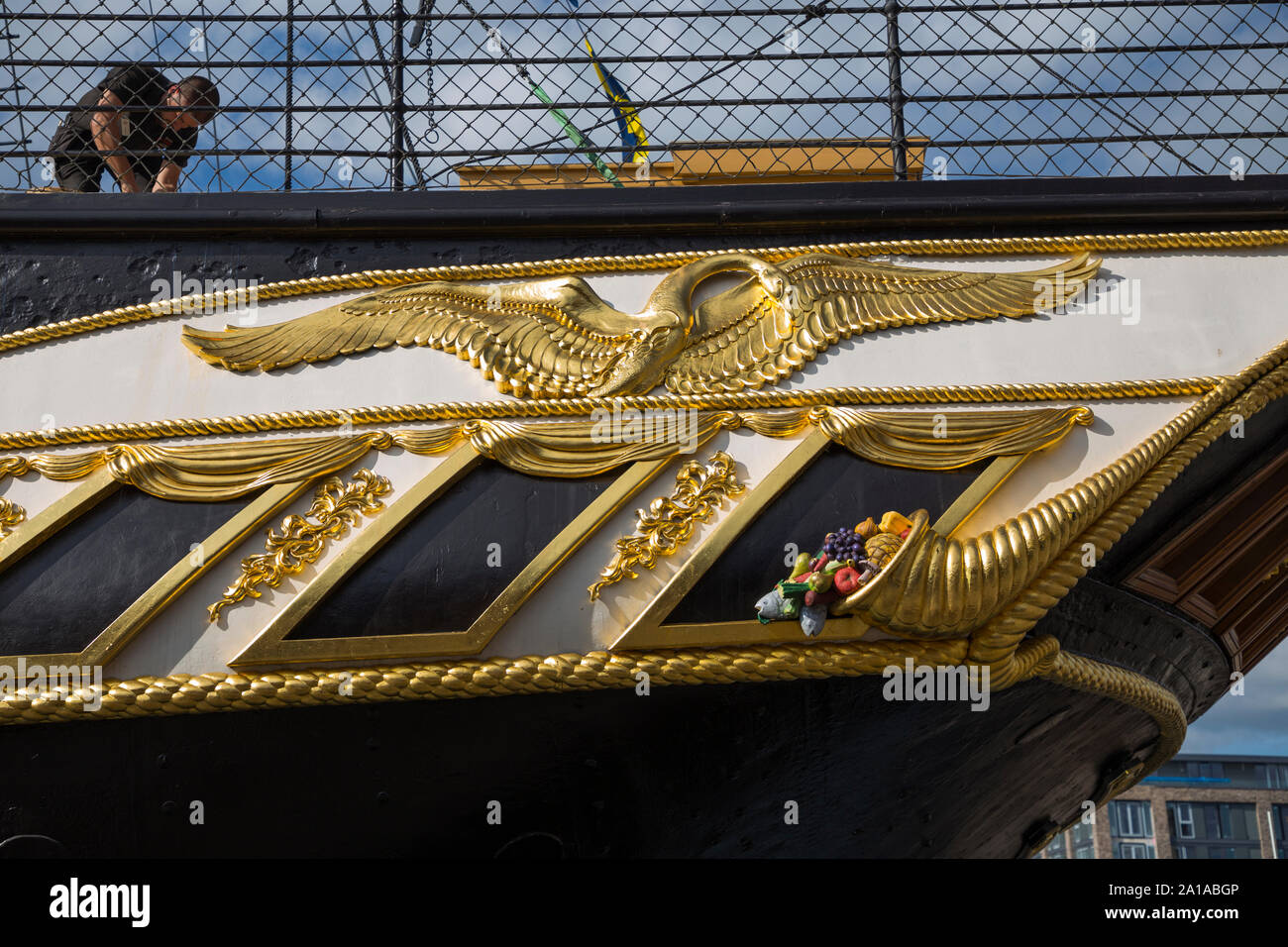Ornamental carving and decoration with a gilded gold swan and cornucopia, around the windows at the stern / rear / back of the SS Great Britain, isambard Kingdom Brunel's iron ship. UK Dockyard Museum, Bristol. UK (109) Stock Photo