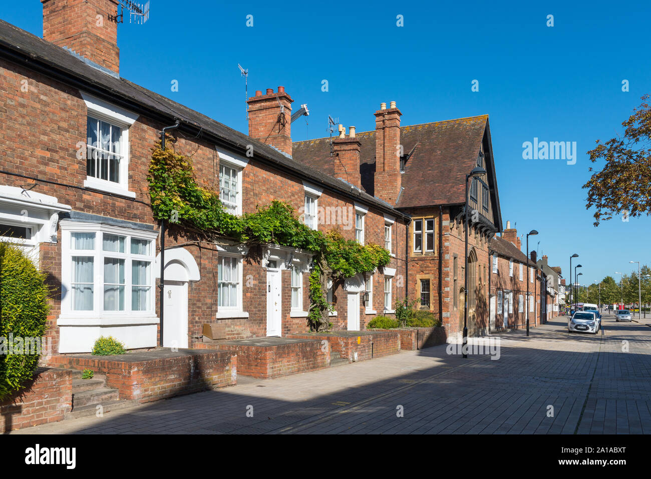 Row of brick cottages in Waterside opposite the Royal Shakespeare Theatre in Stratford-upon-Avon, Warwickshire Stock Photo