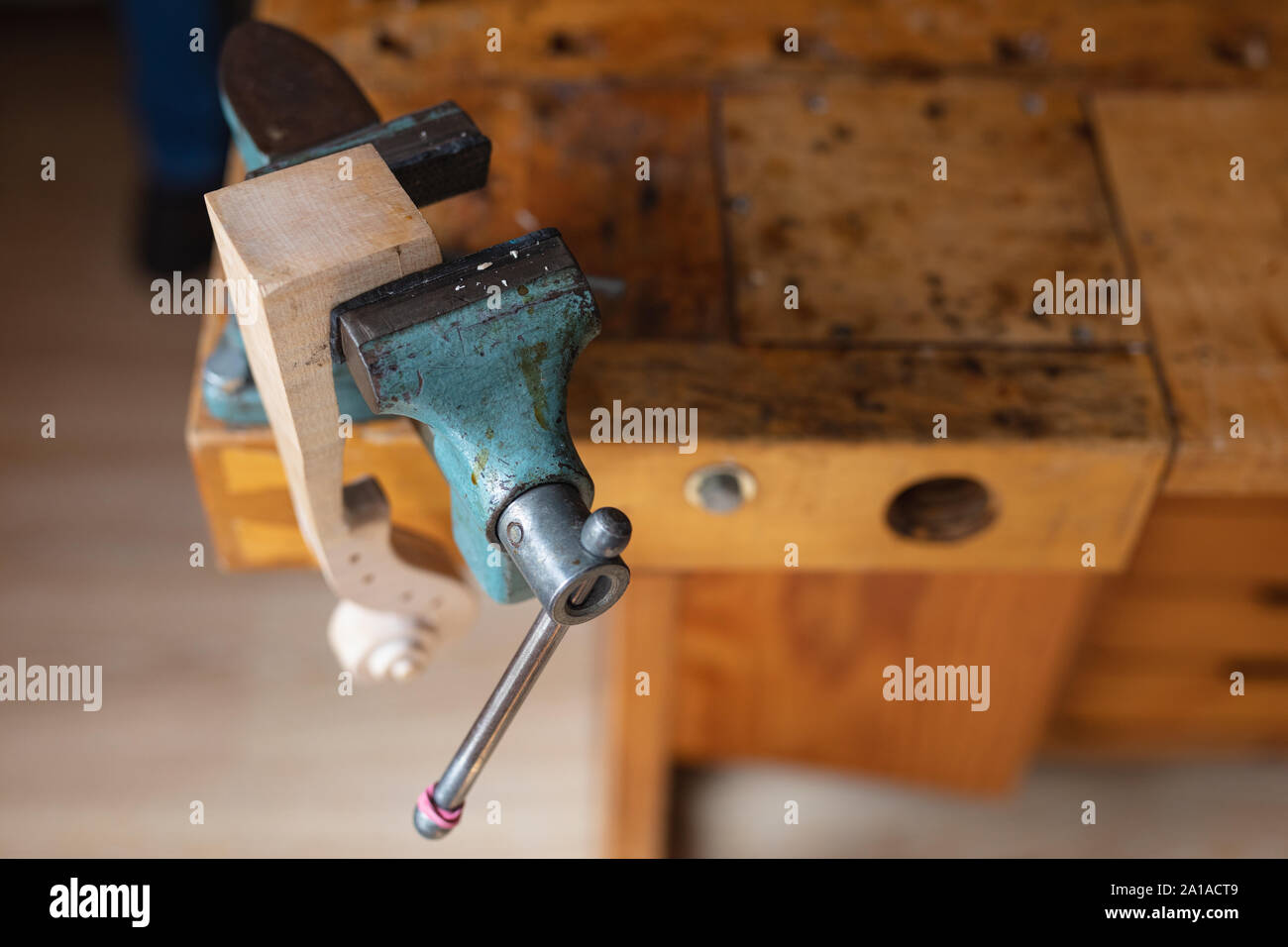 Vice on workbench in a workshop Stock Photo